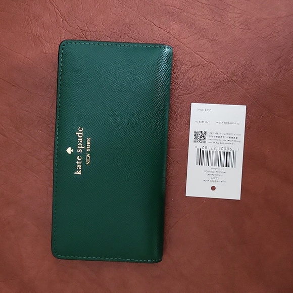 kate spade Handbags - NWT! KATE SPADE ♠️ MADISON LARGE SLIM BIFOLD WALLET IN DEEP JADE!